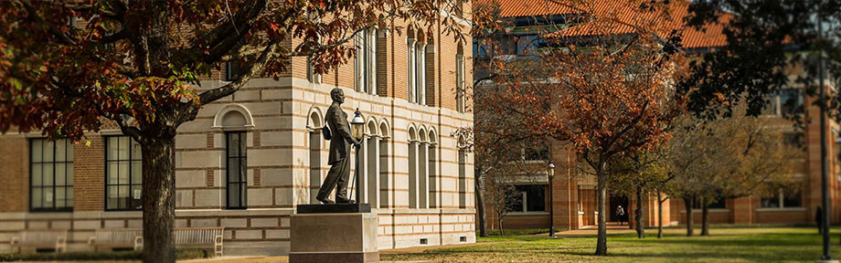 Edgar Odell Lovett Statue on Rice University Campus in the fall