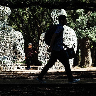 student walking on campus